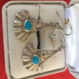 Silver earring with turquoise stone
